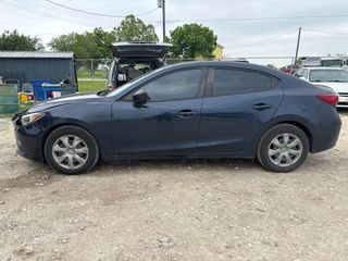 2014 Mazda Mazda3 i Sport - Exterior Side Driver Image